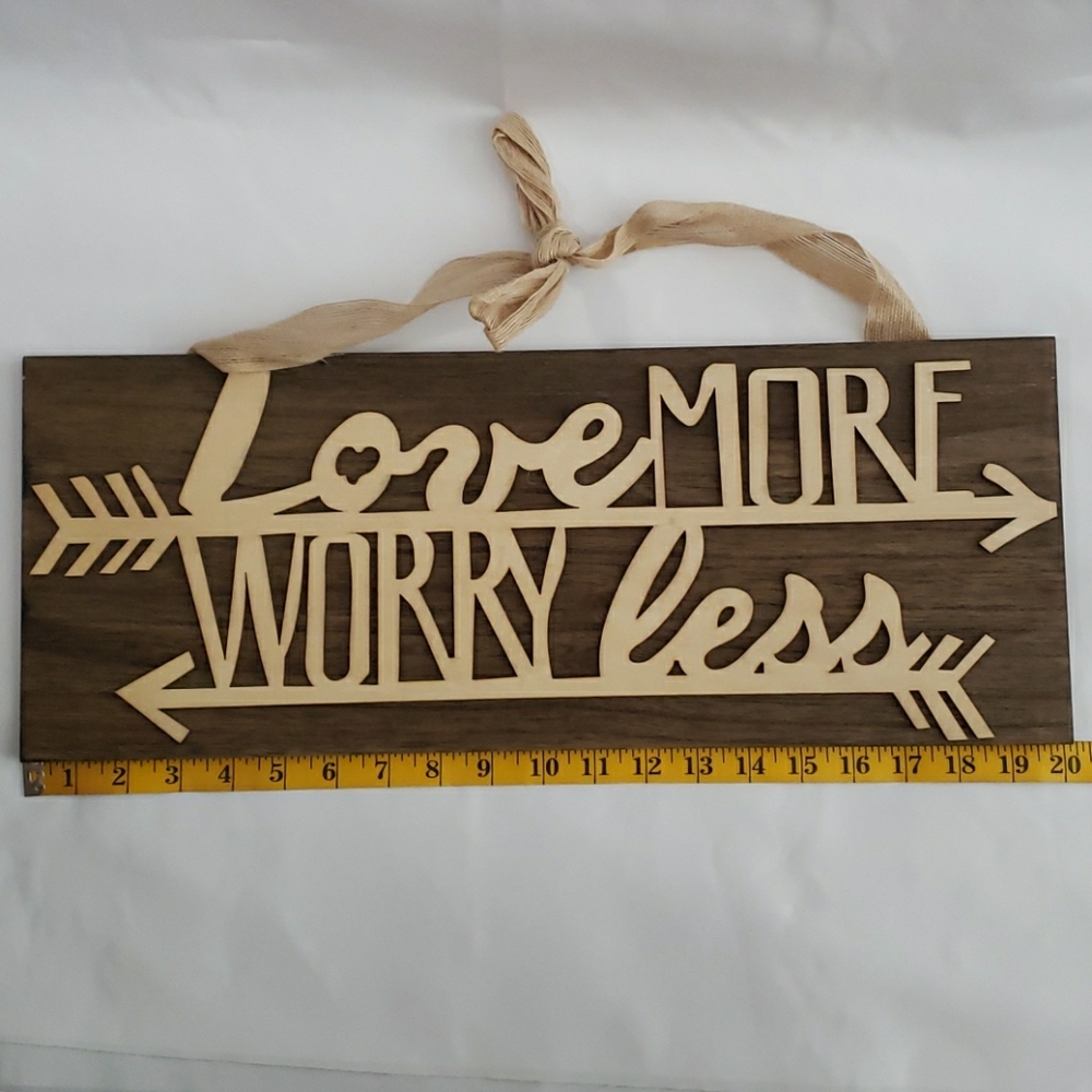 Wood plaque "Love more, worry less".